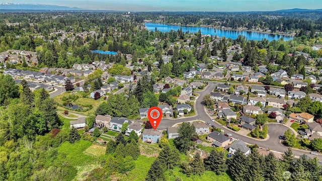 27922 146th Ave SE, Kent, WA 98042 - aerial overview of property's location with a forest, a large body of water, and nearby suburban area