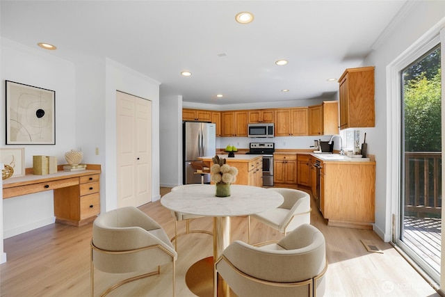 27922 146th Ave SE, Kent, WA 98042 - kitchen with stainless steel appliances, a sink, light wood-type flooring, light countertops, and recessed lighting