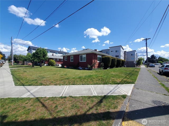 70017003 S D St, Tacoma, WA 98408 - view of side of property with a lawn