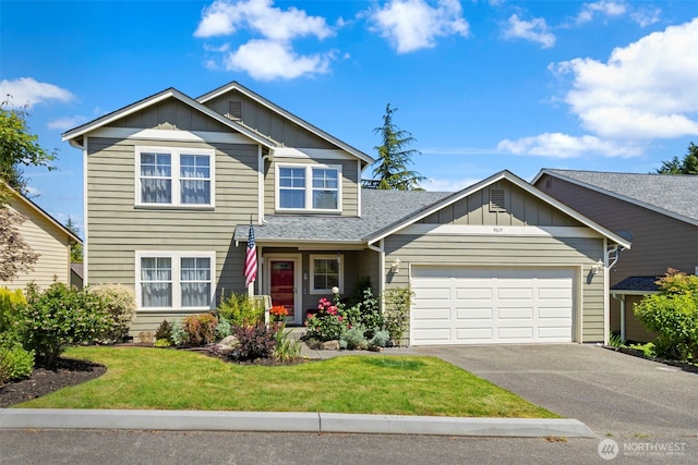 9619 Windswept Ln NW, Silverdale, WA 98383 - traditional-style home featuring board and batten siding, an attached garage, driveway, and a front lawn