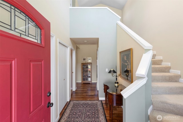 9619 Windswept Ln NW, Silverdale, WA 98383 - foyer entrance featuring a towering ceiling, wood finished floors, and stairs