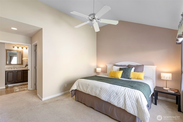 9619 Windswept Ln NW, Silverdale, WA 98383 - bedroom with vaulted ceiling, light colored carpet, connected bathroom, and a ceiling fan