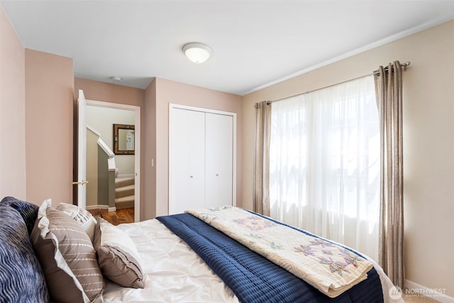 9619 Windswept Ln NW, Silverdale, WA 98383 - bedroom with a closet and baseboards