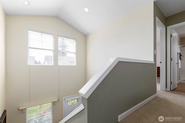 9619 Windswept Ln NW, Silverdale, WA 98383 - hallway with healthy amount of natural light, vaulted ceiling, and carpet flooring