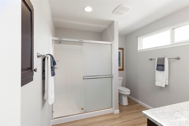 9619 Windswept Ln NW, Silverdale, WA 98383 - bathroom featuring a shower stall, wood finished floors, vanity, and recessed lighting