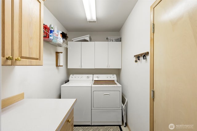 9619 Windswept Ln NW, Silverdale, WA 98383 - washroom featuring cabinet space and washing machine and clothes dryer