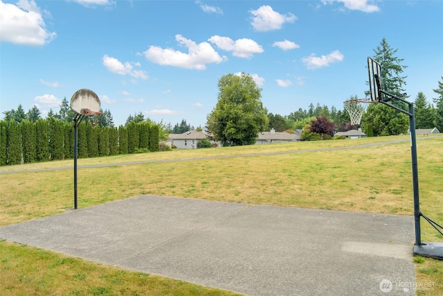 9619 Windswept Ln NW, Silverdale, WA 98383 - view of sport court featuring basketball hoop and a yard