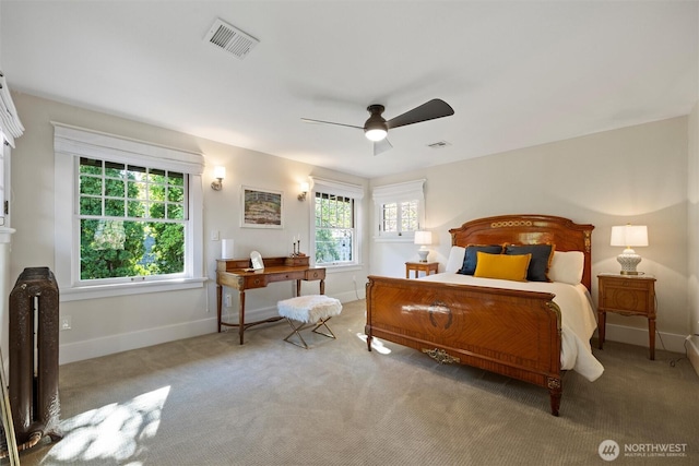 bedroom featuring carpet, baseboards, and ceiling fan