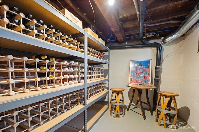wine room featuring concrete flooring