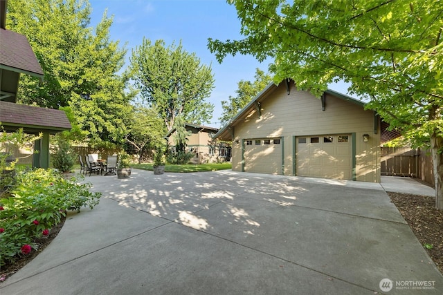 view of front of house with fence