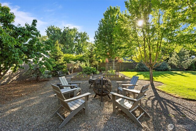 view of patio / terrace with a fire pit