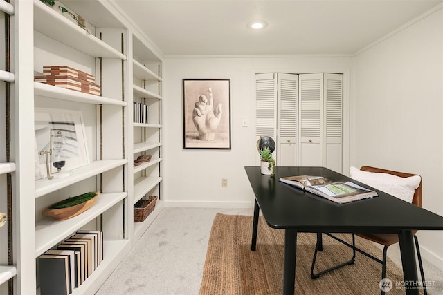 office area with carpet flooring, baseboards, and ornamental molding
