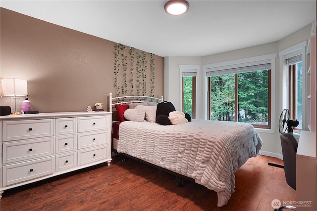 1120 Maple Valley Rd SW, Olympia, WA 98512 - bedroom with dark wood-style flooring