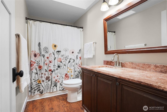 1120 Maple Valley Rd SW, Olympia, WA 98512 - bathroom featuring wood finished floors, vanity, and toilet