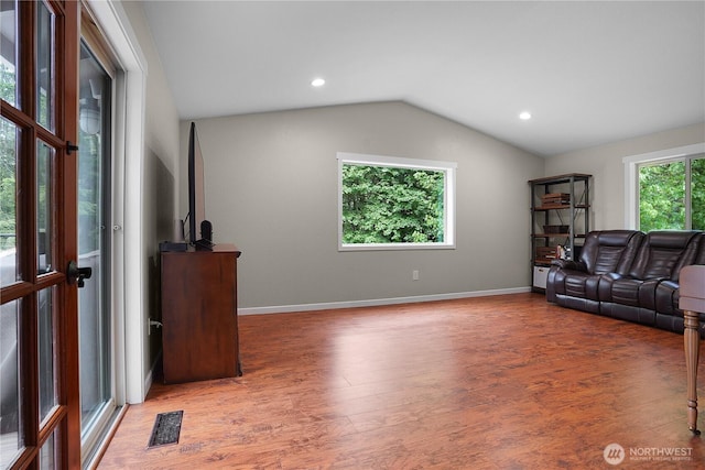 1120 Maple Valley Rd SW, Olympia, WA 98512 - living room with wood finished floors, vaulted ceiling, baseboards, and recessed lighting