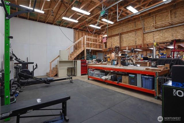 1120 Maple Valley Rd SW, Olympia, WA 98512 - garage with a workshop area and a garage door opener