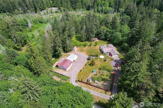 1120 Maple Valley Rd SW, Olympia, WA 98512 - aerial overview of property's location with a heavily wooded area