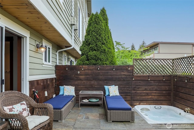 view of patio / terrace featuring fence