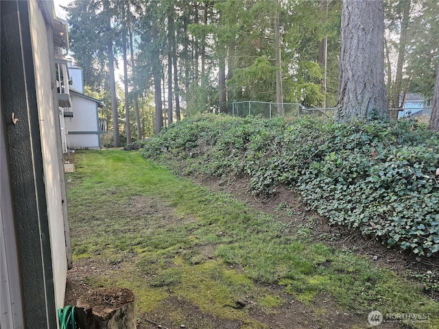 view of yard with fence