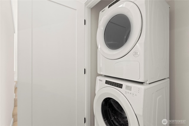 1911C N 120th St, Seattle, WA 98133 - washroom with stacked washer / dryer