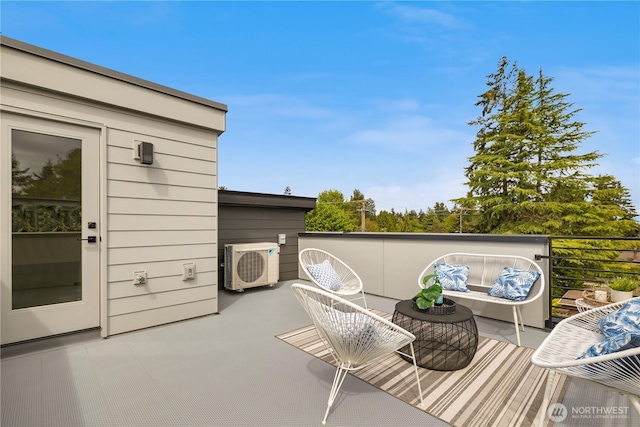 1911C N 120th St, Seattle, WA 98133 - wooden terrace featuring a cooling unit and an outdoor living space