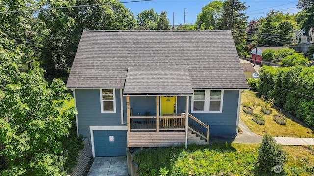 821 15th St, Bremerton, WA 98337 - view of front of home featuring an attached garage, a shingled roof, and stairs