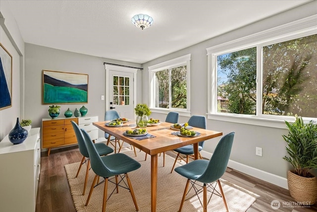 821 15th St, Bremerton, WA 98337 - dining room featuring dark wood finished floors and baseboards
