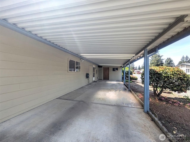 201 Union Ave SE Unit 234, Renton, WA 98059 - view of patio featuring a carport