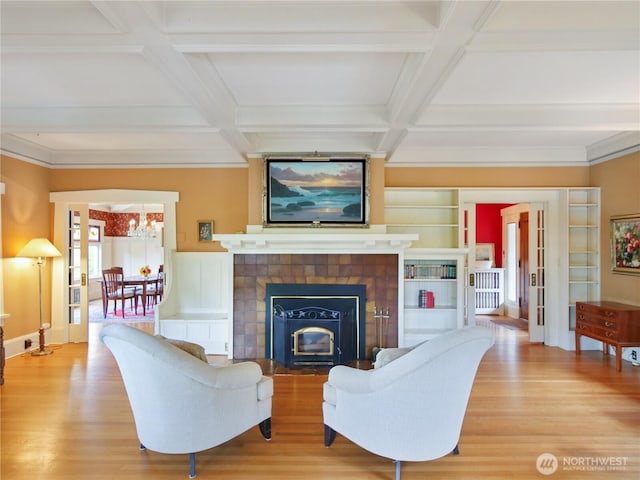 215 N Forest St, Bellingham, WA 98225 - living room with wood finished floors, a chandelier, beam ceiling, coffered ceiling, and ornamental molding