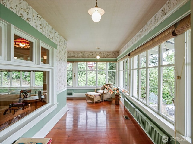 215 N Forest St, Bellingham, WA 98225 - sunroom with wallpapered walls and wood finished floors