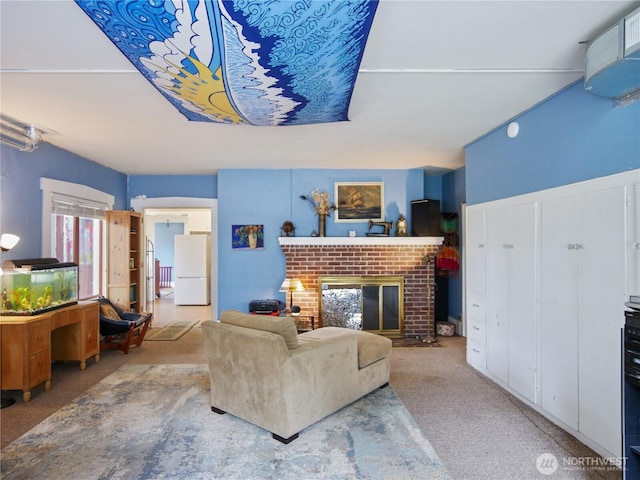 215 N Forest St, Bellingham, WA 98225 - living area featuring a fireplace and carpet floors