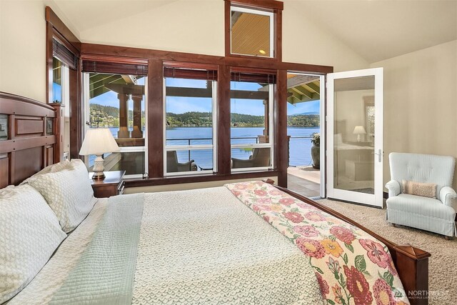 1624 Mallard Ln, Bellevue, WA 98008 - carpeted bedroom featuring lofted ceiling, access to exterior, and a water view