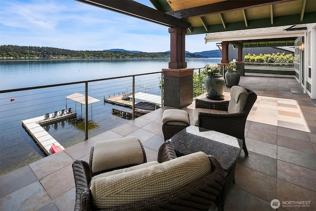 1624 Mallard Ln, Bellevue, WA 98008 - dock area featuring a water view and a balcony