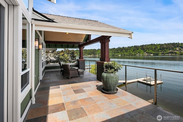 1624 Mallard Ln, Bellevue, WA 98008 - view of patio / terrace with a water view and a forest view