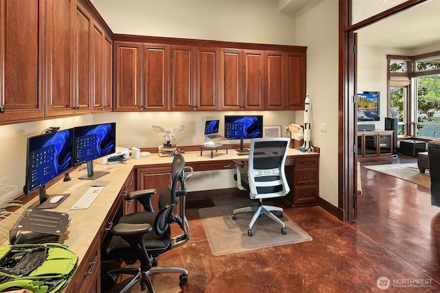 1624 Mallard Ln, Bellevue, WA 98008 - office space featuring built in desk, concrete floors, and baseboards