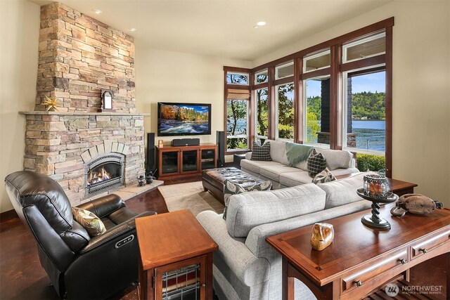 1624 Mallard Ln, Bellevue, WA 98008 - living area featuring a stone fireplace and recessed lighting