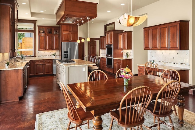 1624 Mallard Ln, Bellevue, WA 98008 - dining space with finished concrete flooring and recessed lighting