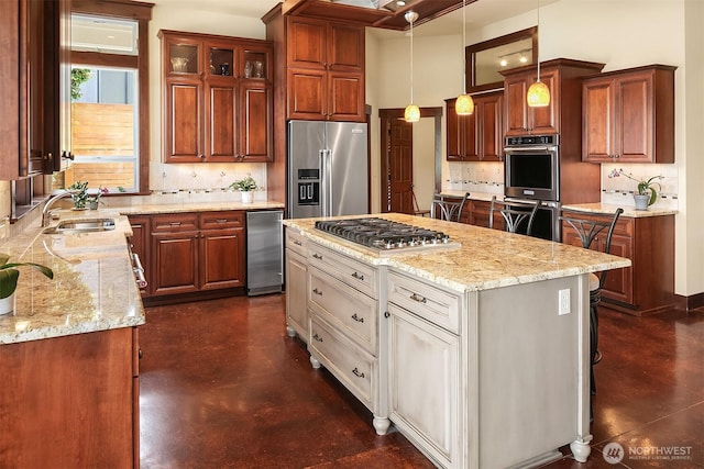 1624 Mallard Ln, Bellevue, WA 98008 - kitchen with appliances with stainless steel finishes, a sink, concrete floors, and backsplash