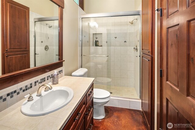 1624 Mallard Ln, Bellevue, WA 98008 - bathroom with toilet, a stall shower, vanity, and tasteful backsplash
