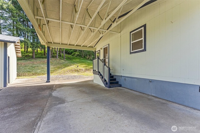 view of patio featuring a carport and entry steps