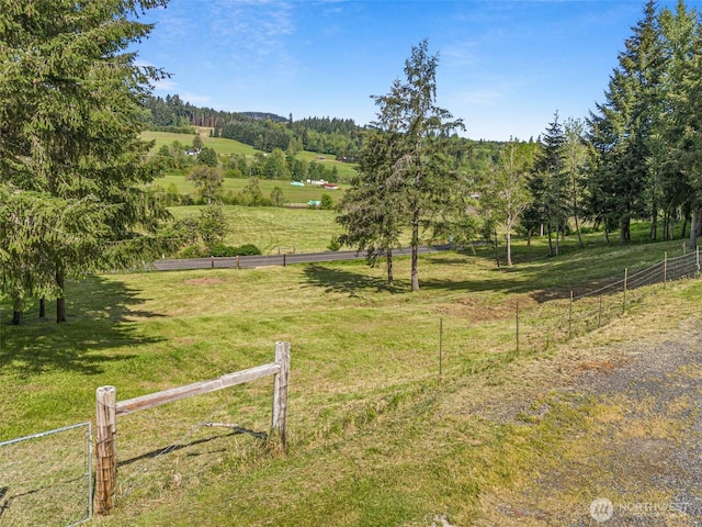 view of yard featuring a view of countryside