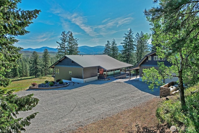 54 Perrow Dr, Winthrop, WA 98862 - view of front of home with a mountain view and dirt driveway