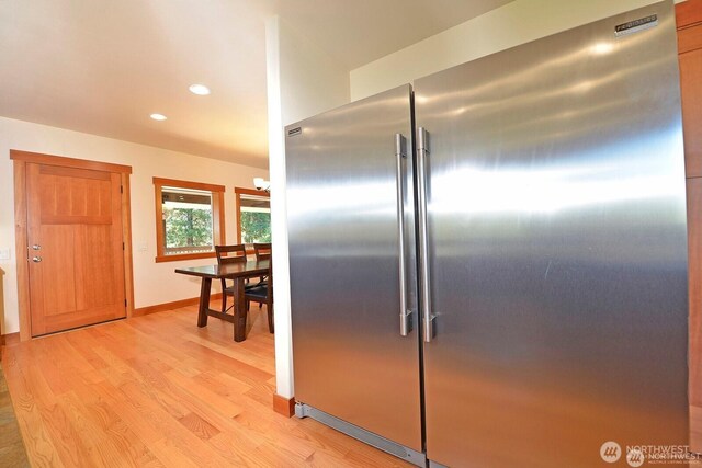 54 Perrow Dr, Winthrop, WA 98862 - kitchen featuring high end refrigerator, light wood-style floors, recessed lighting, and baseboards