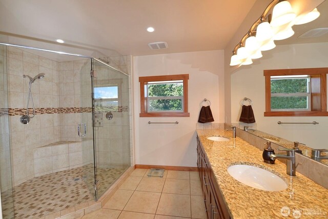 54 Perrow Dr, Winthrop, WA 98862 - full bathroom featuring a stall shower, tile patterned flooring, baseboards, recessed lighting, and double vanity