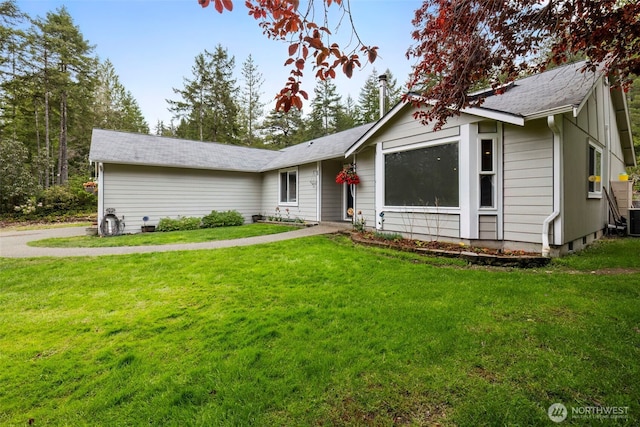 760 Lewis Rd W, Seabeck, WA 98380 - ranch-style house with a front lawn and central AC
