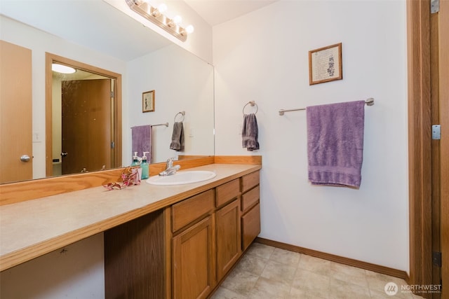 760 Lewis Rd W, Seabeck, WA 98380 - bathroom with vanity and baseboards