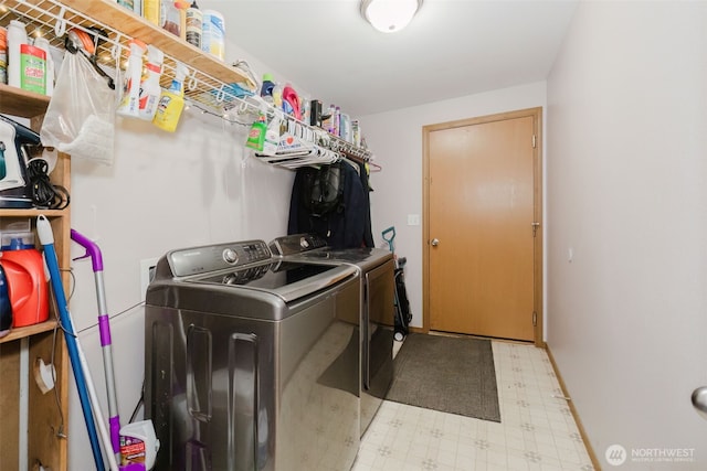 760 Lewis Rd W, Seabeck, WA 98380 - laundry area featuring washer and clothes dryer and light floors