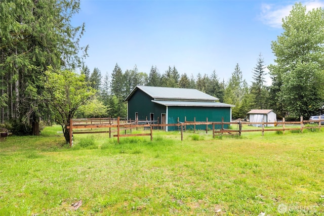 760 Lewis Rd W, Seabeck, WA 98380 - view of yard featuring a pole building and an outdoor structure