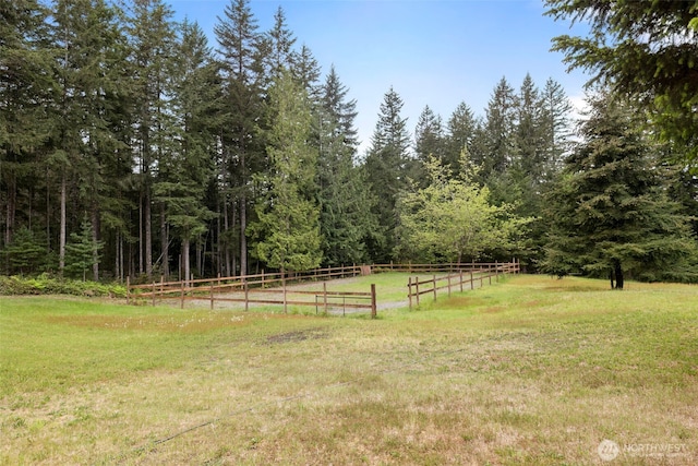 760 Lewis Rd W, Seabeck, WA 98380 - view of yard featuring a forest view