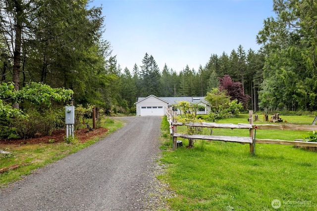 760 Lewis Rd W, Seabeck, WA 98380 - view of front of property with a view of trees, a front lawn, and driveway